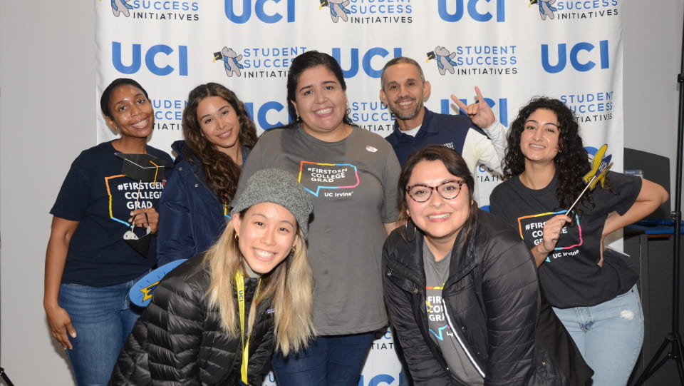 UCI Student Success Initaitives First-Gen staff pose in the photo booth